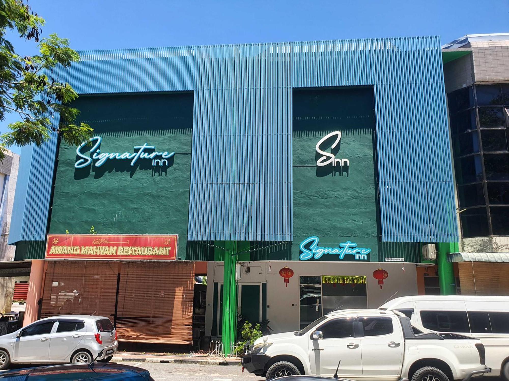 Oyo 91053 Signature Inn Miri Exterior foto